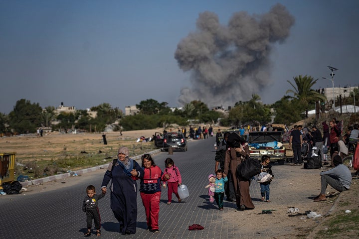 Palestinians flee from east to west of Khan Younis, Gaza Strip, during the ongoing Israeli bombardment, Saturday, Dec. 2, 2023. (AP Photo/Fatima Shbair)