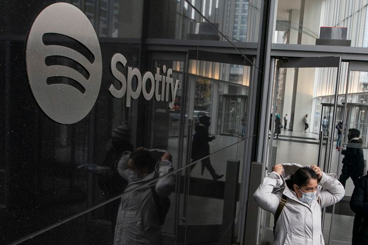 People exit the Spotify headquarters building in Lower Manhattan on January 23, 2023 in New York City.