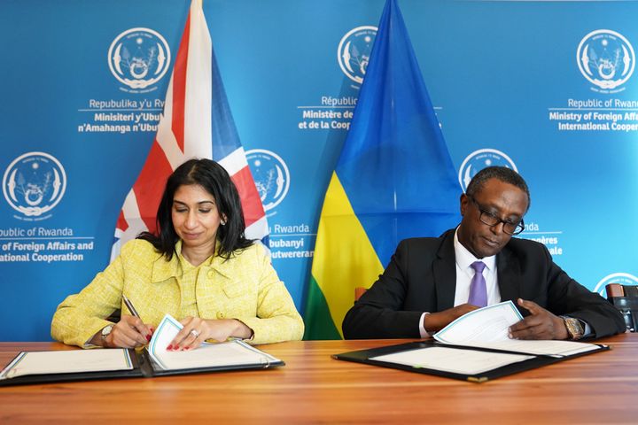 Home Secretary Suella Braverman and Rwandan minister for foreign affairs and international co-operation, Vincent Biruta sign an enhanced partnership deal in Kigali, during her visit to Rwanda. Picture date: Saturday March 18, 2023.