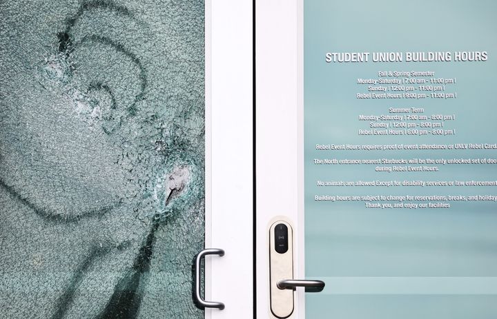 LAS VEGAS, NEVADA - DECEMBER 07: A shattered door is viewed at the student union building the morning after a shooting left three dead at the University of Nevada, Las Vegas campus. (Photo by Mario Tama/Getty Images)