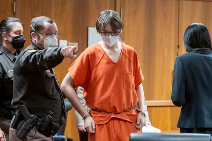 Ethan Crumbley is led away from the courtroom after a placement hearing at Oakland County Circuit Court on February 22, 2022 in Pontiac, Michigan. Crumbley, 15, is charged with the fatal shooting of four fellow students and the wounding of seven others, including a teacher at Oxford High School on November 30, 2021.