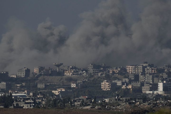 Smoke rises from the Gaza Strip after Israeli strikes on Saturday, Dec. 9, 2023. (AP Photo/Leo Correa)
