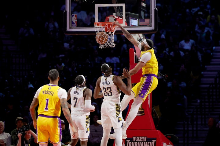 LAS VEGAS, NEVADA - DECEMBER 09: Anthony Davis #3 of the Los Angeles Lakers dunks the ball against Myles Turner #33 of the Indiana Pacers during the fourth quarter in the championship game of the inaugural NBA In-Season Tournament at T-Mobile Arena on December 09, 2023 in Las Vegas, Nevada. NOTE TO USER: User expressly acknowledges and agrees that, by downloading and or using this photograph, User is consenting to the terms and conditions of the Getty Images License Agreement. (Photo by Ethan Miller/Getty Images)