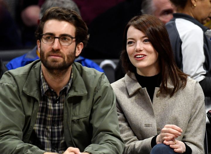 Emma Stone and Dave McCary attend the Golden State Warriors and Los Angeles Clippers basketball game on Jan. 18, 2019. Stone said she accidentally gave herself a black eye before their 2020 nuptials.