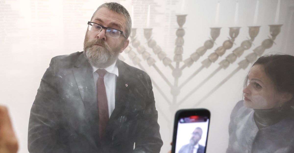 NextImg:Far-Right Polish Lawmaker Uses Fire Extinguisher On Hanukkah Candles In Parliament