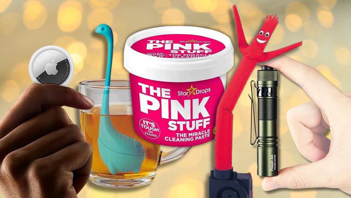 An Apple AirTag, the Baby Nessie loose tea infuser, Pink Stuff cleaning paste, a mini waving inflatable tube guy and an extra-bright mini flashlight.