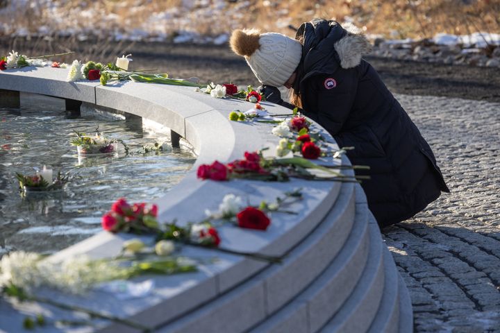 A mourner visits the Sandy Hook Permanent Memorial on the 10th anniversary of the school shooting in Newtown, Connecticut.