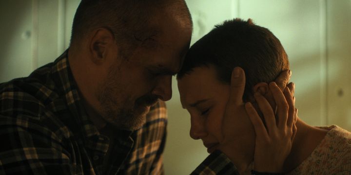 David Harbour as Jim Hopper (left) and Millie Bobby Brown as Eleven in "Stranger Things." The Netflix series was broken up into two parts for its fourth season.