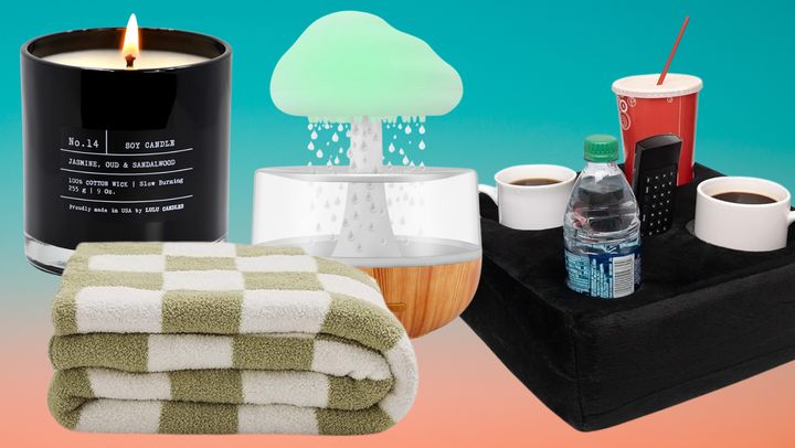 A luxury-scented candle, a plush blanket, a light up rain cloud essential oil diffuser and a Cup Cozy Pillow.