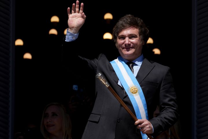 Argentina's newly sworn-in president, Javier Milei, waves to supporters from a balcony in Buenos Aires, Argentina, on Dec. 10, 2023.