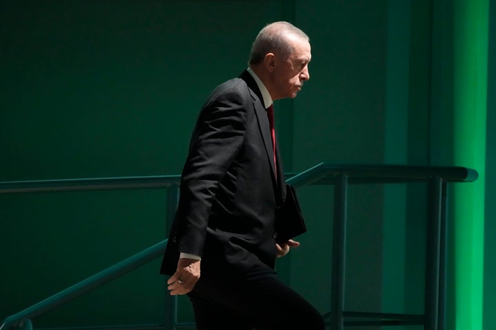 Turkey President Recep Tayyip Erdogan arrives to speak at a plenary session at the COP28 U.N. Climate Summit, Friday, Dec. 1, 2023, in Dubai, United Arab Emirates. (AP Photo/Peter Dejong)