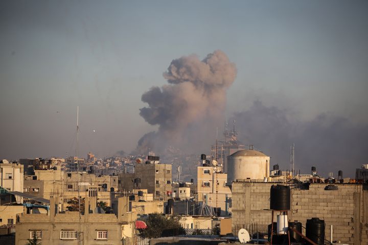 Smoke rises from Israeli air strikes on the city of Khan Younis, Gaza, on Friday.
