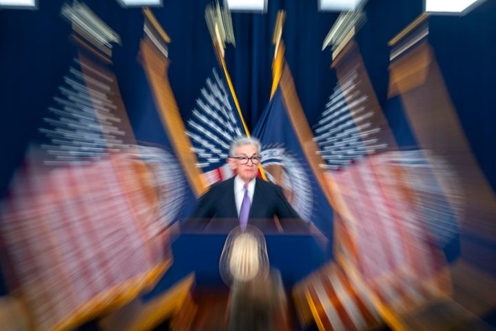 In this photo made with a slow shutter speed, Federal Reserve Board Chair Jerome Powell speaks during a news conference about the Federal Reserve's monetary policy at the Federal Reserve, Wednesday, Dec. 13, 2023, in Washington. (AP Photo/Alex Brandon)