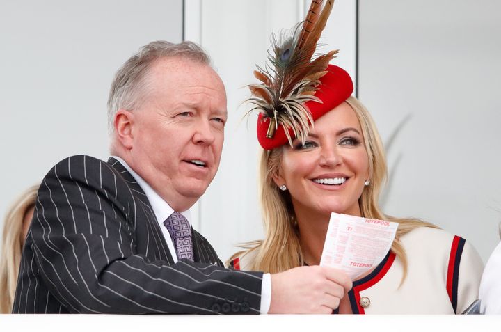 Doug Barrowman and Baroness Michelle Mone watch the racing as they attend Gold Cup Day at the Cheltenham Festival in 2019.
