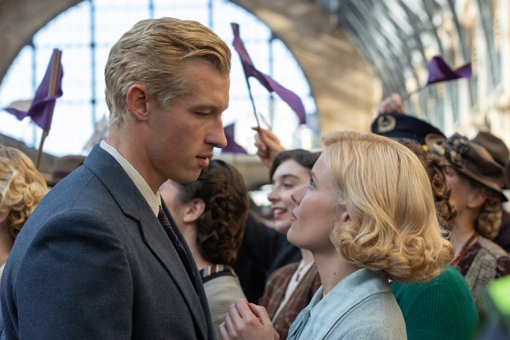 Actors Callum Turner (left) and Hadley Robinson (right) look into each other's eyes during an emotional scene in George Clooney-directed film "The Boys in the Boat."