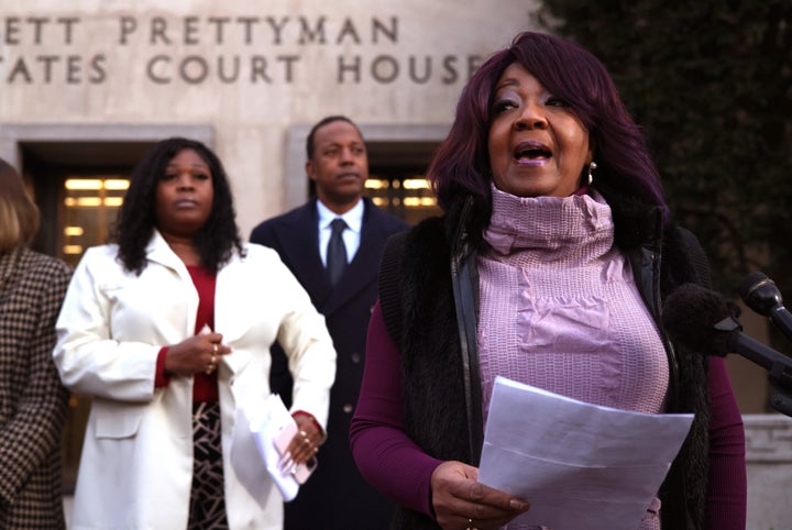 Georgia election workers Ruby Freeman and her daughter, Shaye Moss, speak outside of the E. Barrett Prettyman U.S. District Courthouse on Dec. 15 in Washington, D.C. A jury has ordered Rudy Giuliani, the former personal lawyer for Donald Trump, to pay $148 million in damages to the two Fulton County election workers.