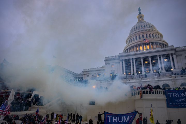Tear gas is fired as supporters of President Donald Trump storm the U.S. Capitol on Jan. 6, 2021, while Congress meets in a joint session.