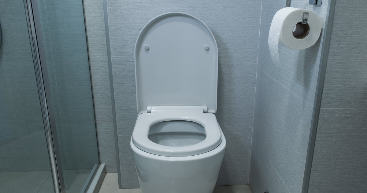 Want To Poop Better? Your Dog Might Have The Answer.