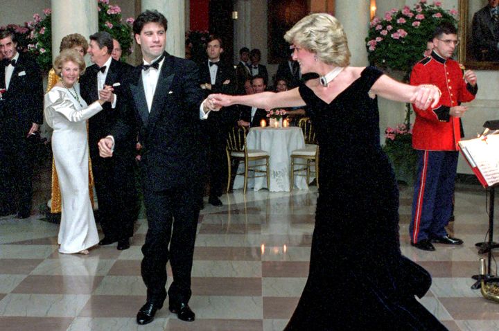 Princess Diana dances with John Travolta in Cross Hall at the White House