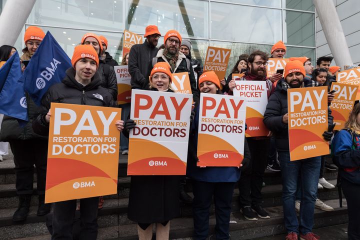 Members of the British Medical Association take part in a 72-hour strike over pay in London on December 20, 2023.