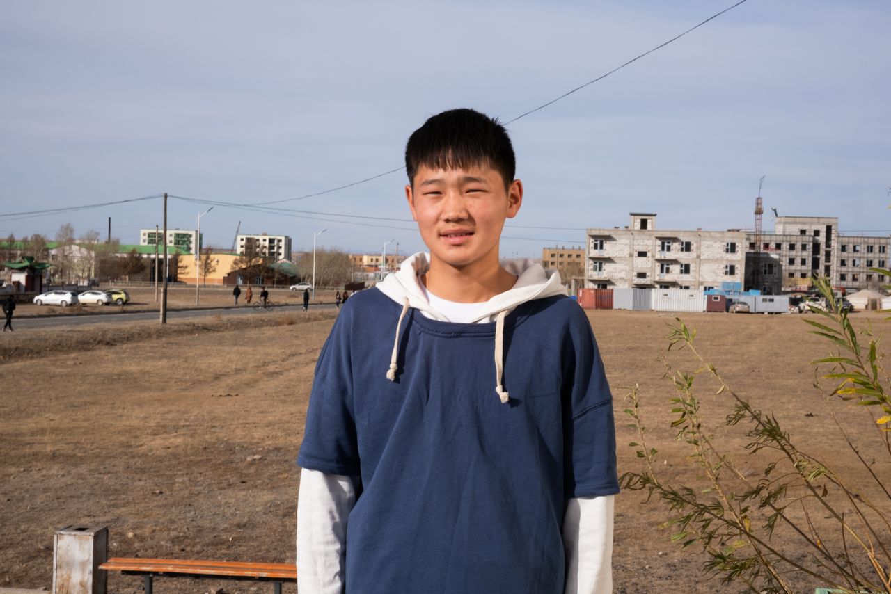 Byambadorj Enkhsaikhan, 16, lives in a dormitory in central Kharkhorin, an ancient capital of the Mongol Empire. The student has anguished over his parents' mounting difficulties cultivating herds on the steppe.