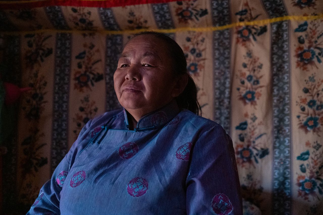 Gombo-Ochir Batdulam, 57, sits in her family's ger on an evening in October.