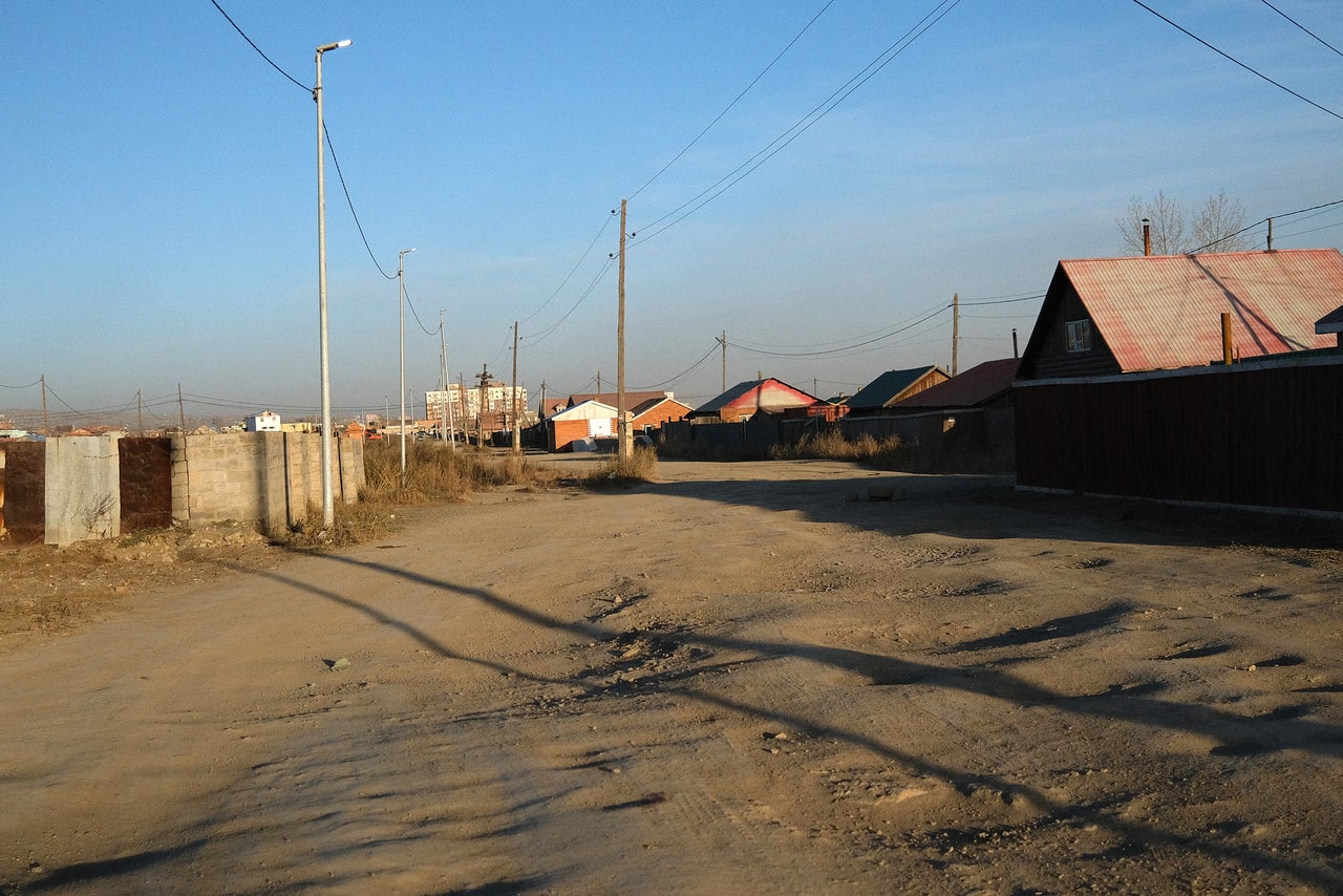 An unpaved roadway in among Ulaanbaatar's western ger districts, unintended areas where wanderers leaving difficulty in the countryside come and established camp.