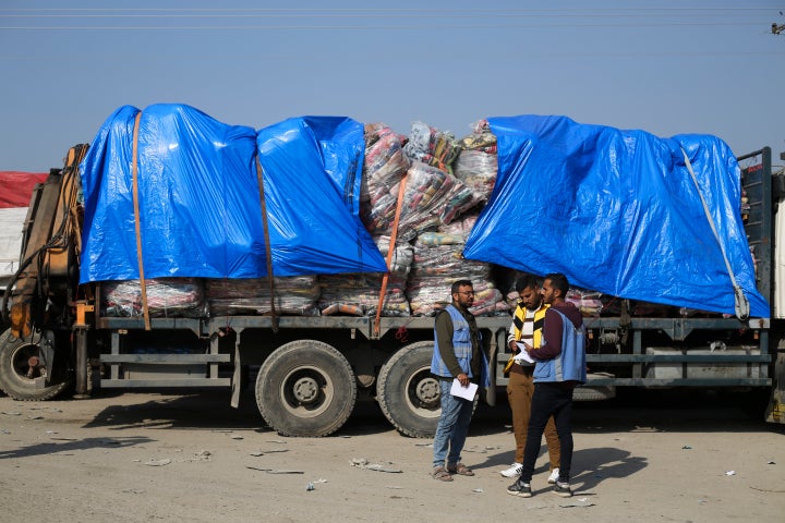 Humanitarian aid trucks enter through a crossing from Israel into the Gaza Strip on Dec. 18.