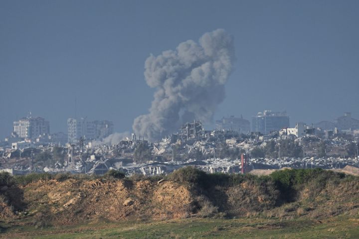 Smoke rises following an Israeli bombardment in the Gaza Strip, as seen from southern Israel, Sunday, Dec. 24, 2023. The army is battling Palestinian militants across Gaza in the war ignited by Hamas' Oct. 7 attack into Israel. (AP Photo/Ariel Schalit)