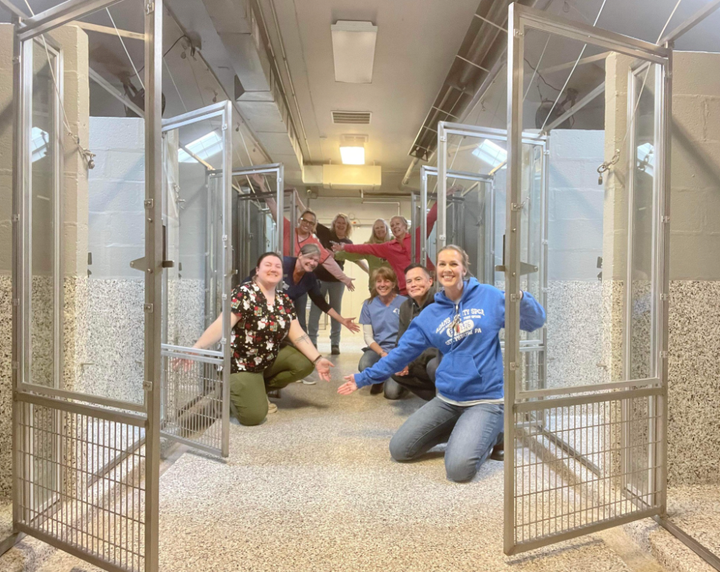 People at the Adams County SPCA celebrate having a shelter without any dogs after many animals were adopted or reunited with their owners.