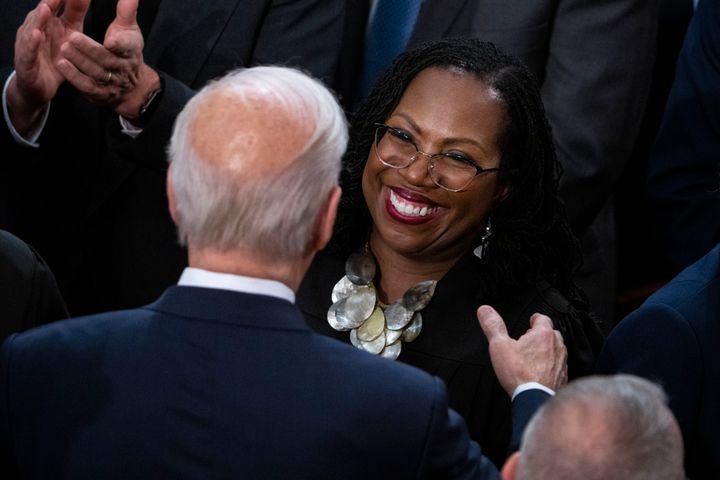 Supreme Court Justice Ketanji Brown Jackson (right) greets President Joe Biden before his State of the Union address at the U.S. Capitol on Feb. 7, 2023.