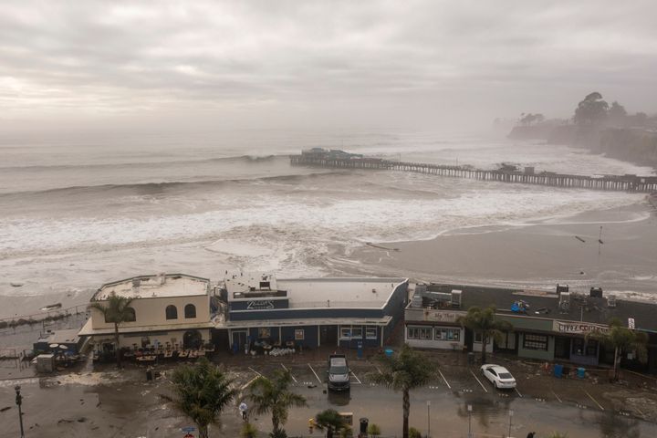 Large waves crash near Capitola, Calif., Thursday, Dec. 28, 2023. Powerful surf is rolling onto beaches on the West Coast and Hawaii as a big swell generated by the stormy Pacific Ocean pushes toward shorelines. (AP Photo/Nic Coury)