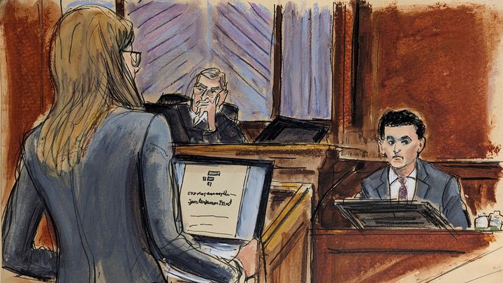 In this courtroom sketch, FTX founder Sam Bankman-Fried, right, is cross examined by Assistant US Attorney Danielle Sassoon, left, while Judge Lewis Kaplan listens, center, in Manhattan federal court, Monday, Oct. 30, 2023, in New York. (Elizabeth Williams via AP)