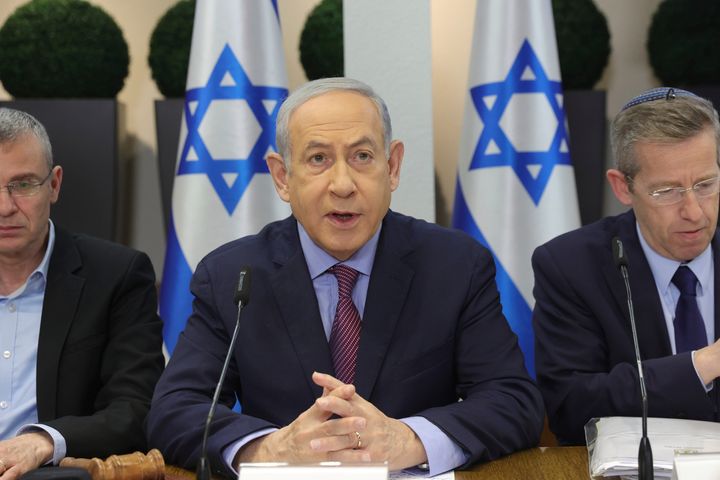 Israeli Prime Minister Benjamin Netanyahu attends the weekly cabinet meeting at the the Kirya military base in Tel Aviv, Israel, Sunday Dec. 31, 2023. (Abir Sultan/Pool Photo via AP)