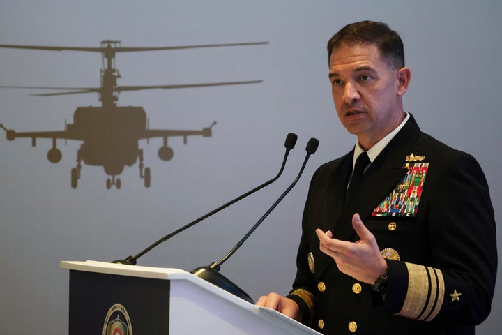U.S. Navy Vice Adm. Brad Cooper, who heads the Navy's Bahrain-based 5th Fleet, speaks at an event at the International Defense Exhibition and Conference in Abu Dhabi, United Arab Emirates, Feb. 21, 2023. The top commander of U.S. naval forces in the Middle East says Yemen’s Houthi rebels are showing no signs of ending their “reckless” attacks on commercial ships in the Red Sea. But Vice Adm. Brad Cooper said in an Associated Press interview on Saturday that more nations are joining the international maritime mission to protect vessels in the vital waterway and trade traffic is beginning to pick up. (AP Photo/Jon Gambrell, File)