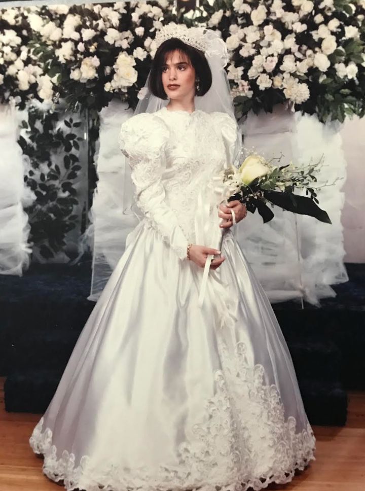 The author on her wedding day. "I was a 19-year-old bride, in the world's ugliest turtleneck gown and the world's ugliest wig," she writes.