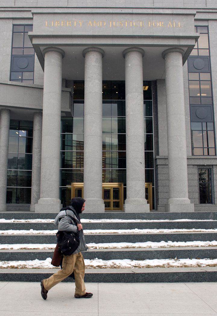 A man walks past the Ralph L. Carr Colorado Judicial Center in Denver, which celebrated its official opening in January last year. 