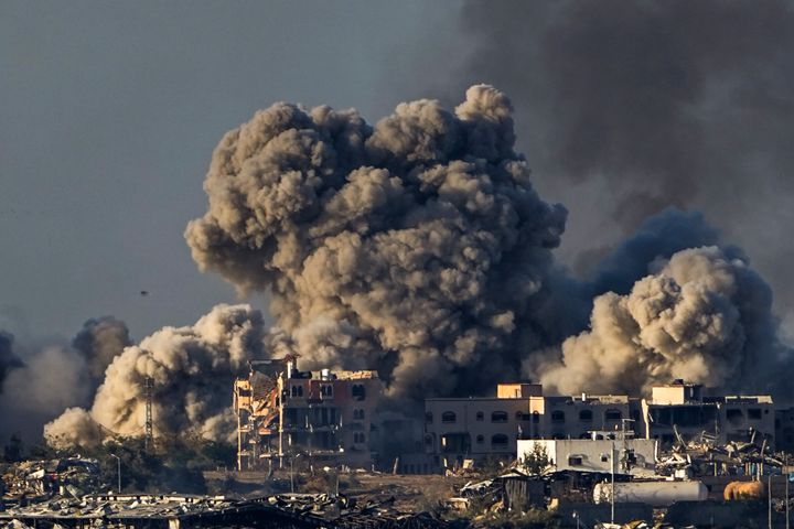 FILE - Smoke rises following an Israeli bombardment in the Gaza Strip, as seen from southern Israel, Saturday, Dec. 16, 2023. South Africa has launched a case at the United Nations' top court alleging that Israel's military campaign in Gaza amounts to genocide. The filing and Israel's decision to defend itself at the International Court of Justice sets up a high-stakes showdown in the before a bench of the court's black-robed judges in the wood-panelled Great Hall of Justice. (AP Photo/Ariel Schalit, File)