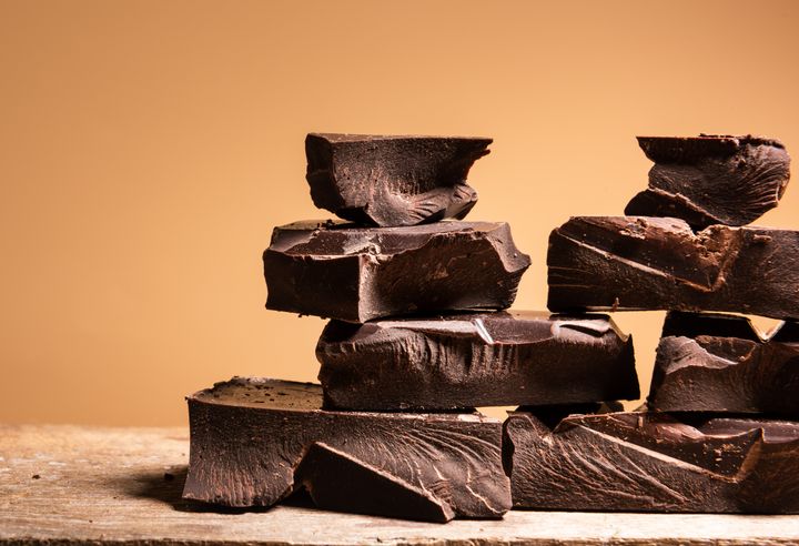 The cocoa in chocolate is believed to influence serotonin release, possibly contributing to migraines.