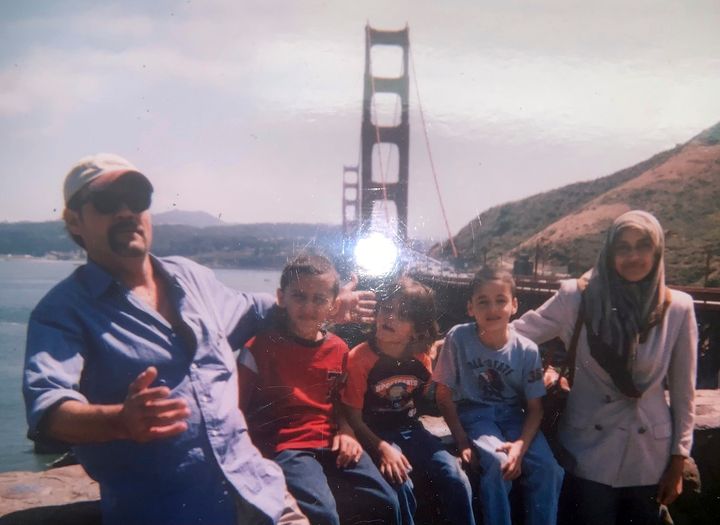 This undated image provided by Fadi Sckak shows a family photo of Abedalla Sckak with his wife Zahra Sckak and children. Abedalla Sckak, 56, died after being shot in the fighting in Gaza last month. He is the father of three American sons, including a U.S. service member. The U.S. coordinated with Israel, Egypt and others to rescue the mother of a U.S. service member who had been trapped by fighting in Gaza. A official said Zahra Sckak made it out of Gaza on New Year's Eve, along with her American brother-in-law.