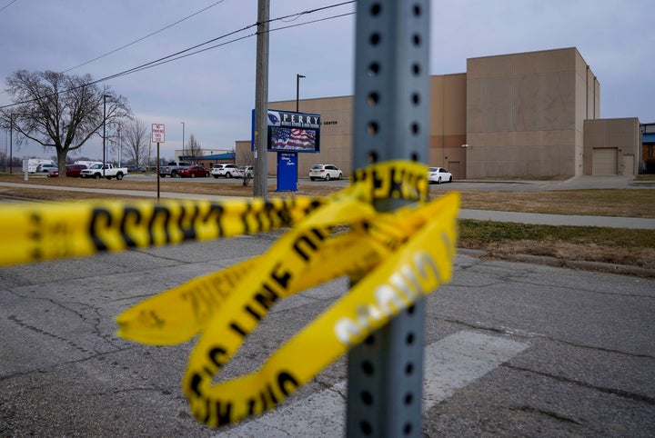 Tape blocks all entrances at the Perry Middle School and High School building on Friday, Jan. 5, 2024, in Perry, Iowa. A day after a shooting sent bullets flying inside the small-town Iowa high school, leaving a sixth grader dead and others wounded, the community of Perry is somber. (AP Photo/Bryon Houlgrave)