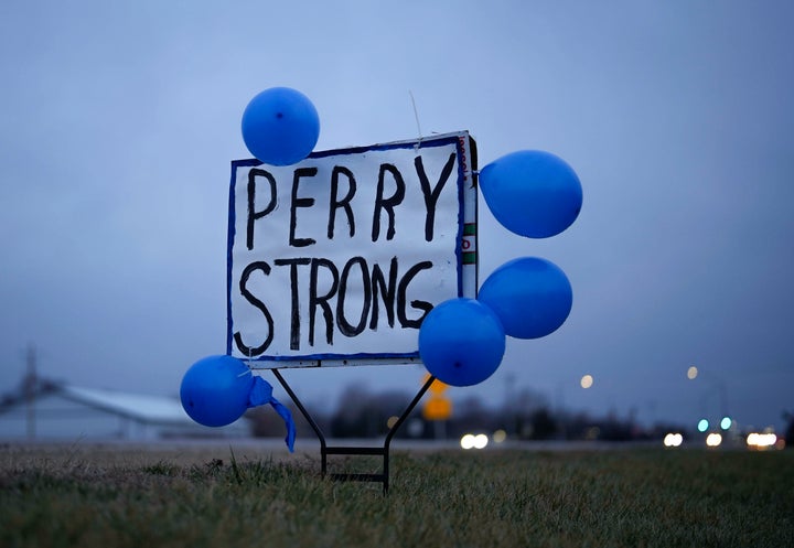 A sign along Highway 141 in Granger, Iowa, shows support for the neighboring community of Perry on Friday, Jan. 5, 2024, following a shooting at the Perry Middle School and High School building the previous day. (AP Photo/Bryon Houlgrave)