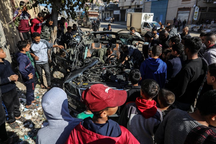 KHAN YUNIS, GAZA - JANUARY 07: A view of the wrecked car after two more Palestinian journalists who have been identified as Hamza Wael Al-Dahdouh, the son of Al Jazeera Gaza bureau chief Wael Al-Dahdouh, and Mustafa Thuraya, were killed in an Israeli bombing on their car in the city of Khan Younis, Gaza on January 07, 2024. (Photo by Abed Rahim Khatib/Anadolu via Getty Images)