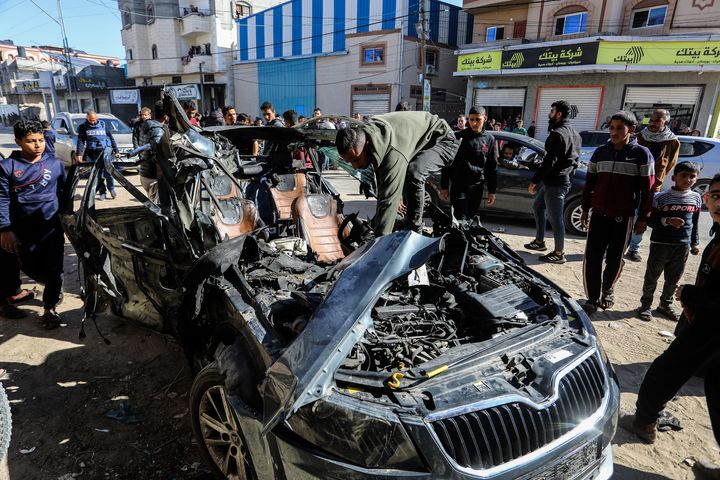 A view of the wrecked car that carried Palestinian journalists Mustafa Thuraya and Hamza Dahdouh, the son of Al Jazeera Gaza bureau chief Wael Dahdouh. The two journalists were killed in an Israeli bombing on their car on Sunday.