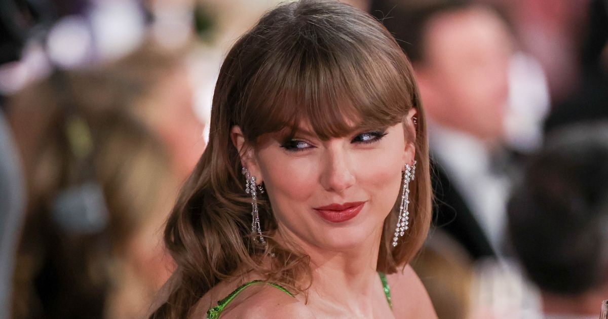 Taylor Swift Seems Unamused By Jo Koy's Joke About Her At Golden Globes