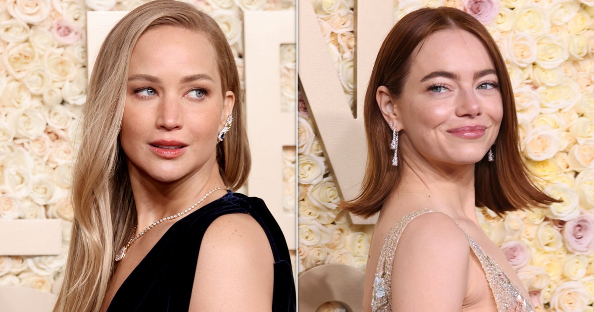 NextImg:Jennifer Lawrence Seems Happier For Emma Stone's Golden Globe Win Than If She'd Won