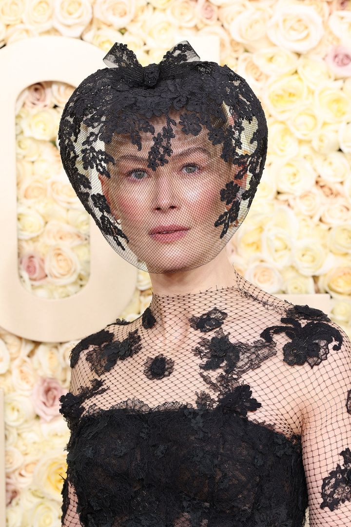 Rosamund Pike's headpiece deserves an award of its own