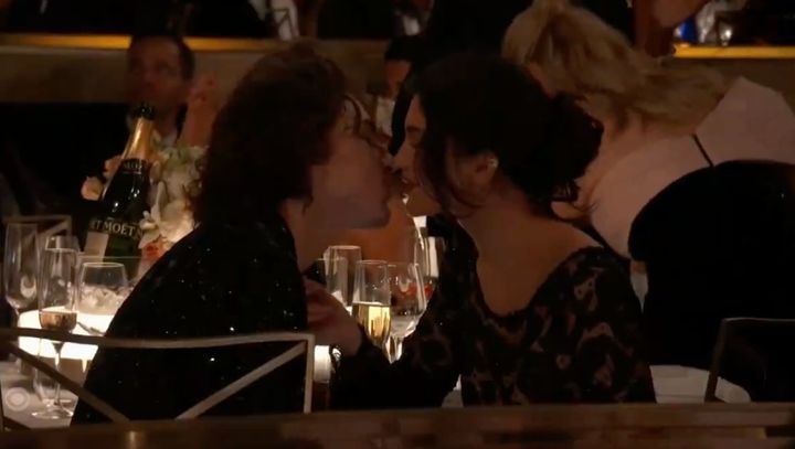 Timothée Chalamet and Kylie Jenner share a kiss at the 2024 Golden Globes