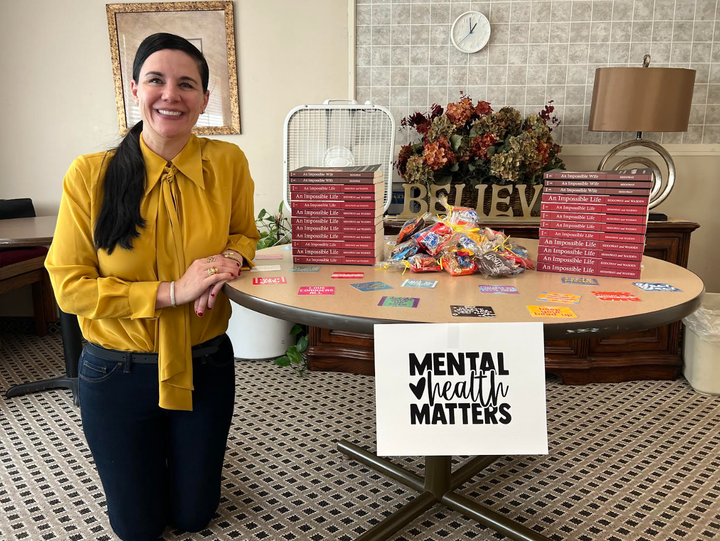 The author sharing her story and donating books to the women at Metro Hope Ministries, an alcohol and drug recovery program in Minneapolis.