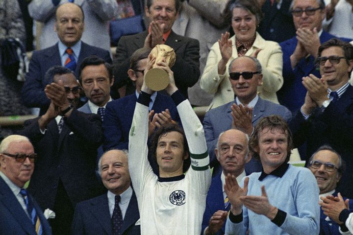 Franz Beckenbauer holds up the World Cup trophy after West Germany defeated the Netherlands by 2-1 in 1974